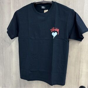 Stussy Black Short Sleeve Tee with Red Logo and Light Blue Heart Graphic